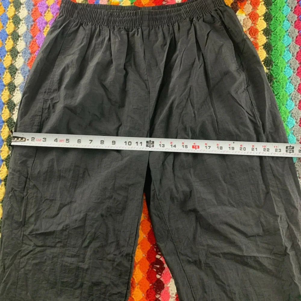 Vintage 90s Reebok Nylon Embroidered Logo Zip Leg Track Pants Joggers Sw…